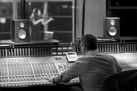 Wide studio console during recording session